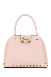 Pink leather small Rockstud handbag -  | Wise